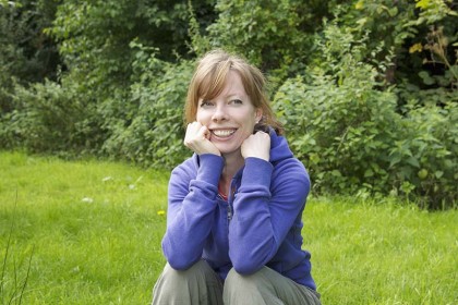 woman wearing blue jumper posing for mums magazine