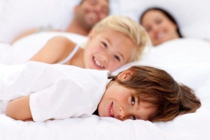 Bed bugs family in bed together