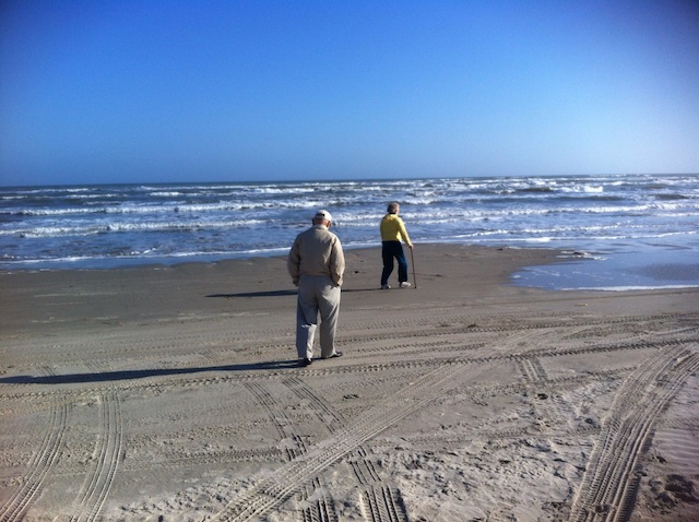 elderly couple on a beach