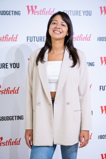 Ellie Austin-Williams wearing cream jacket poses for mums magazine and offers Tips to manage finances  to Fintokkers