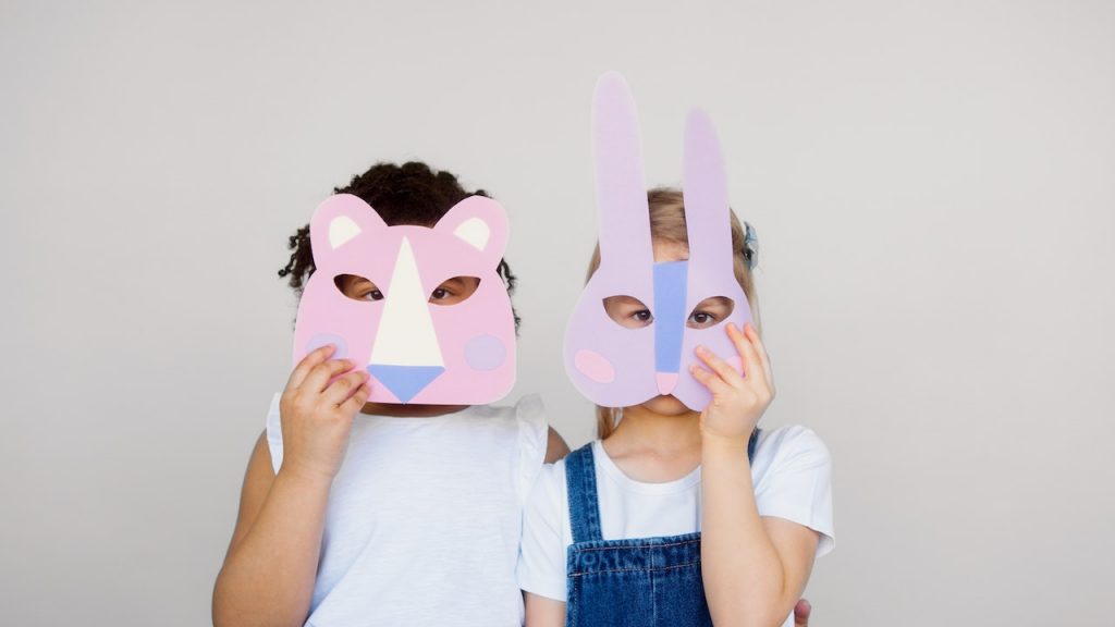 two children in animal masks