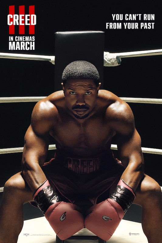 creed III movie poster 2023 showing michael b jorden in the boxing ring 