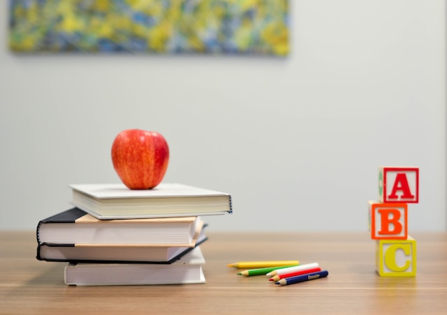 back to school table with books element5-digital-OyCl7Y4y0Bk-unsplash