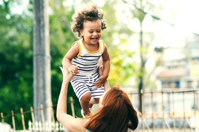 mum playing with baby
