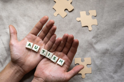 word autism on hands