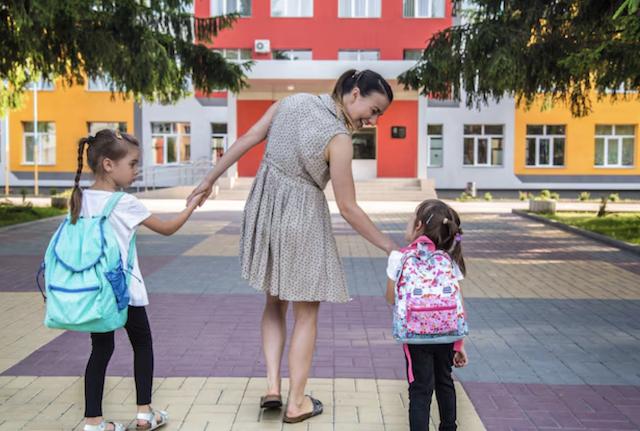 mum getting kids ready for school